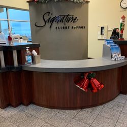 Signature Flight Support - Service desk decorated for holidays.