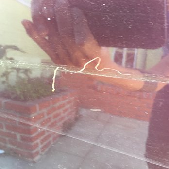 J Flores Construction - a man working on a window - General Contractors Near Me - San Francisco, California J Flores Construction - a man working on a window - General Contractors Near Me - San Francisco, California