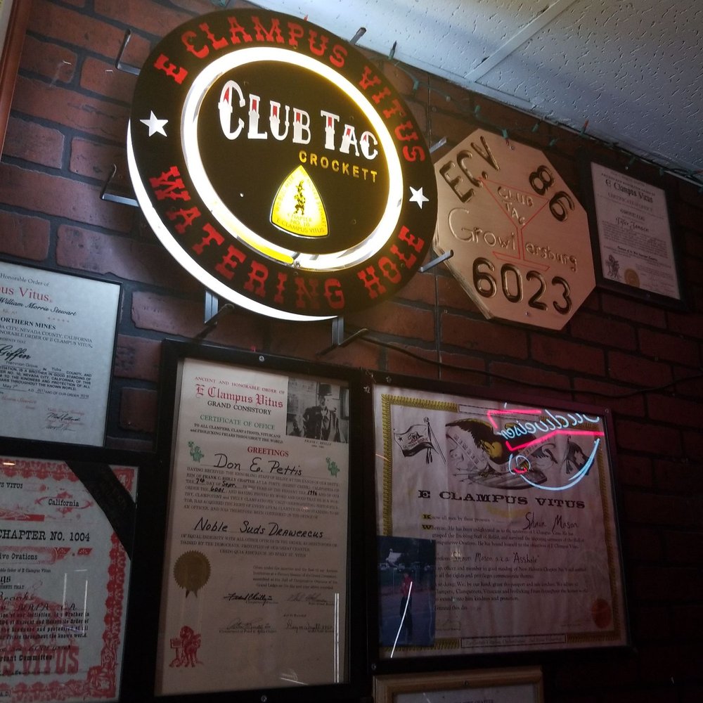 Club Tac - a neon sign above a brick wall - Dive Bars Near Me - Crockett, California Club Tac - a neon sign above a brick wall - Dive Bars Near Me - Crockett, California