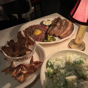 Monkey Bar - Crab Rangoon, steak tartare, whitefish caesad - American Near Me - New York, New York Monkey Bar - Crab Rangoon, steak tartare, whitefish caesad - American Near Me - New York, New York