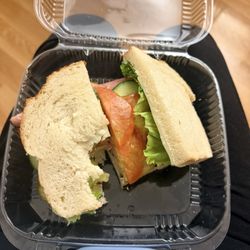 Tumbleweed Cafe - Ham and turkey on sour dough with cucumbers, lettuce, tomatoes, and pickle.