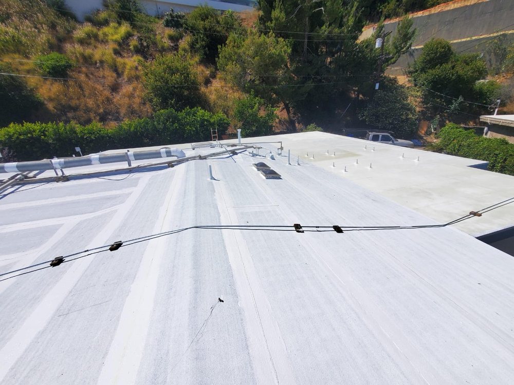 Slide of SLR Roofing