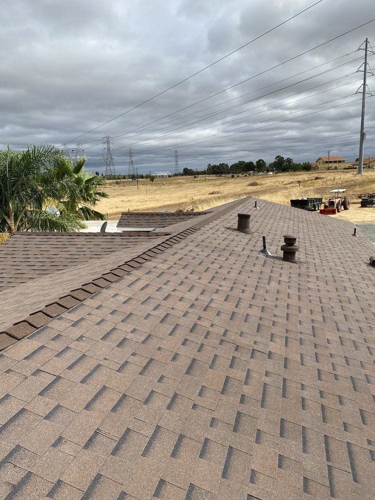 Slide of Jason’s Quality Roofing