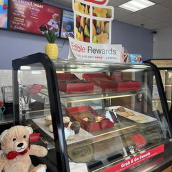 Edible Arrangements - Display case is full! Come pick up a fruit box!