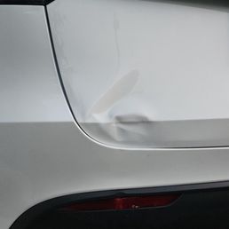 My brand new Model Y carelessly reversed into another vehicle by staff at Tesla collision Oceanside.