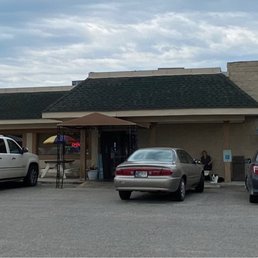 Entrance and sign from parking lot.