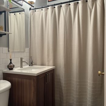 Grout Pros NYC - Bathroom vanity, new lighting, wall tile and floor - Painters Near Me