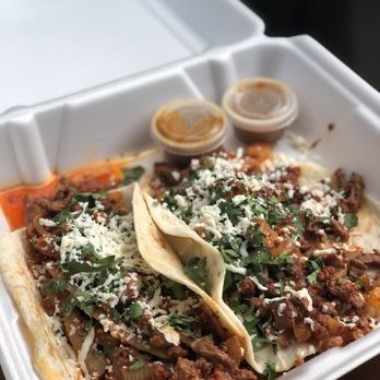 Bomb Tacos - two tacos in a styrofoam container - Mexican Near Me - Austin, Texas