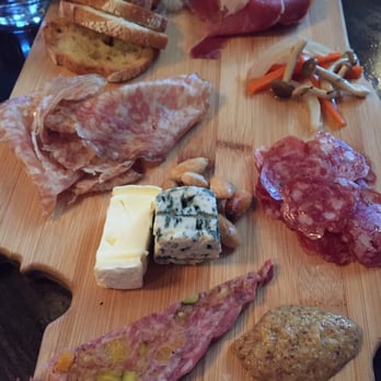 Canon - Meat n cheese plate on a cut out piece of wood of Washington. - New American Near Me - Seattle, Washington