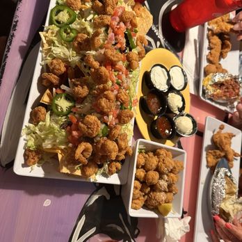 Fudpucker's - Seafood nachos and Gator Tail A La Fud - Seafood Near Me - Destin, Florida Fudpucker's - Seafood nachos and Gator Tail A La Fud - Seafood Near Me - Destin, Florida