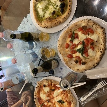 Gusta Pizza - Top is pesto special, middle is margarita and bottom is cheese pizza - Italian Near Me - Florence, FI Gusta Pizza - Top is pesto special, middle is margarita and bottom is cheese pizza - Italian Near Me - Florence, FI