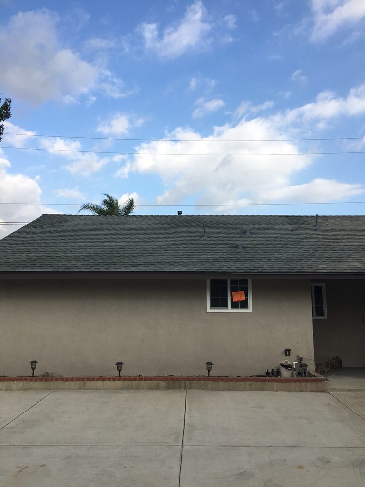 Slide of Affordable Roofing and Rain Gutters