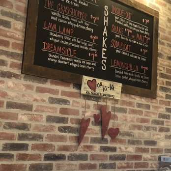 Moo La La - a menu on a brick wall - Desserts Near Me - Miramar Beach, Florida Moo La La - a menu on a brick wall - Desserts Near Me - Miramar Beach, Florida