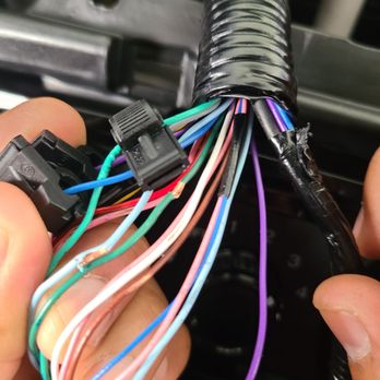 Stereo Pros - They left wires frayed or stripped. Any of the wires touch metal and would short out the stereo. - Car Stereo Installation Near Me - Corona, California Stereo Pros - They left wires frayed or stripped. Any of the wires touch metal and would short out the stereo. - Car Stereo Installation Near Me - Corona, California