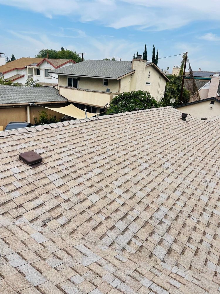 Slide of Golden Touch Roofing