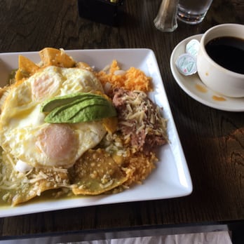 Cafe con Leche - The Chilaquiles drenched in delicious Verde sauce - Mexican Near Me - Chicago, Illinois