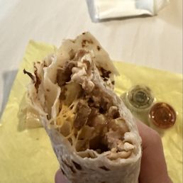 First bite, showcasing melted cheese.
