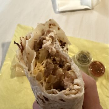 Arizona Burrito - First bite, showcasing melted cheese. - Desserts Near Me - Mesa, Arizona