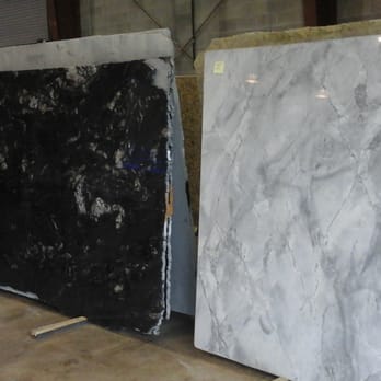 Stone Source - two large slabs of marble in a warehouse - Countertop Installation Near Me - Nicholasville, Kentucky Stone Source - two large slabs of marble in a warehouse - Countertop Installation Near Me - Nicholasville, Kentucky