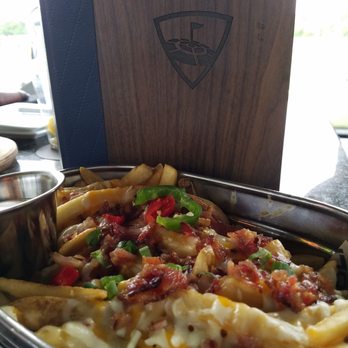 Topgolf - Loaded cheese fries with pecan smoked bacon!! #heaven - New American Near Me - Edison, New Jersey Topgolf - Loaded cheese fries with pecan smoked bacon!! #heaven - New American Near Me - Edison, New Jersey