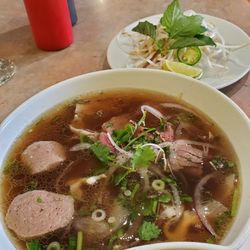 Hoang Gia Vietnamese Cuisine - Pho House Special (small) Rare Wagyu beef, beef ball, beef flank, tripe, tendon (missing), rice noodle and Wagyu beef broth