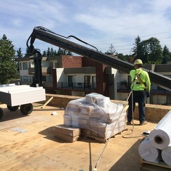 D & D Construction - a worker on the roof of a building - General Contractors Near Me - Orting, Washington D & D Construction - a worker on the roof of a building - General Contractors Near Me - Orting, Washington