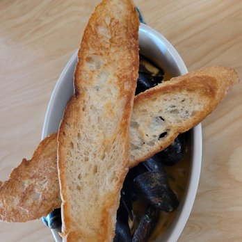 Clyde's Fine Diner - PEI Mussels. Fresh and delicious. The sauce is to die for. I could eat an entire loaf of bread dipping it in the sauce. - Diners Near Me - Des Moines, Iowa