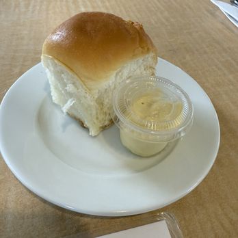 White Guava Cafe - Roll with Lilikoi butter - Burgers Near Me - Hilo, Hawaii White Guava Cafe - Roll with Lilikoi butter - Burgers Near Me - Hilo, Hawaii