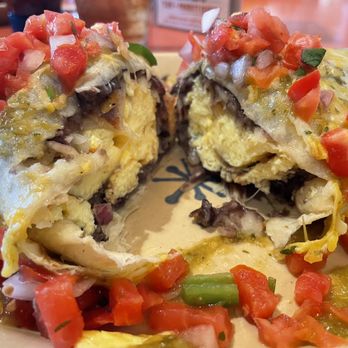 Snooze, an A.M. Eatery - Breakfast burrito - wet. Huge and delicious! - Breakfast & Brunch Near Me - Orange, California Snooze, an A.M. Eatery - Breakfast burrito - wet. Huge and delicious! - Breakfast & Brunch Near Me - Orange, California