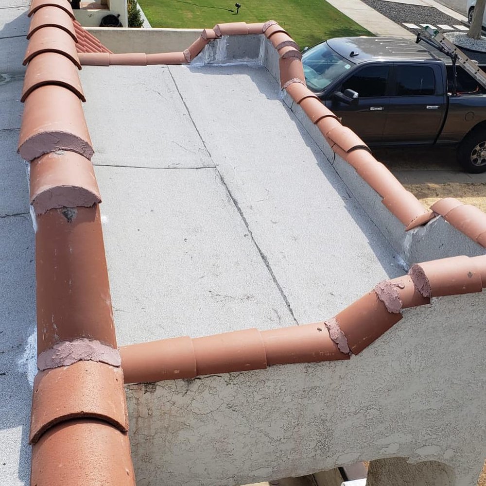 Slide of ADG Roofing & Construction