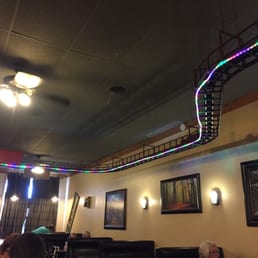 Train tracks run along the ceiling.