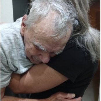 La Paloma Flower Shop - Laurie comforting another dear friend who was devastated about Hutchie's loss. We ALL were. - Florists Near Me - Phoenix, Arizona
