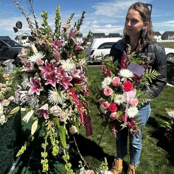 Avas Flowers - This is a large spray from another florist and the "large" spray that was delivered by Avas Florist - Florists Near Me Avas Flowers - This is a large spray from another florist and the "large" spray that was delivered by Avas Florist - Florists Near Me