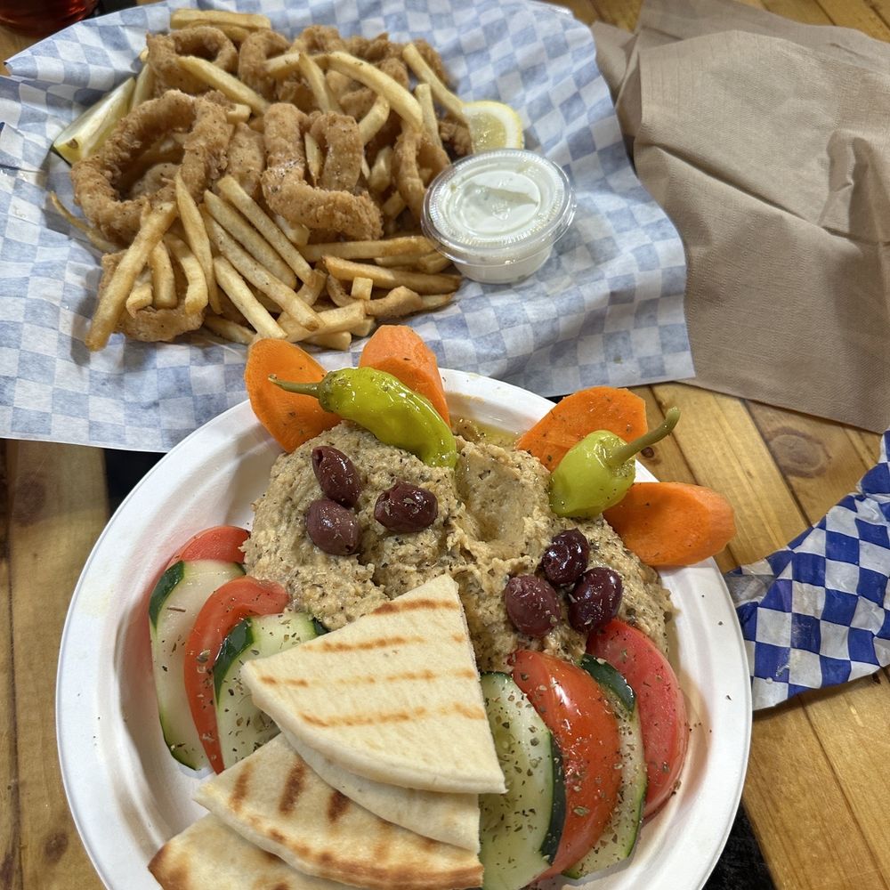Gyro King - a plate of food on a table - Mediterranean Near Me - Denver, Colorado Gyro King - a plate of food on a table - Mediterranean Near Me - Denver, Colorado