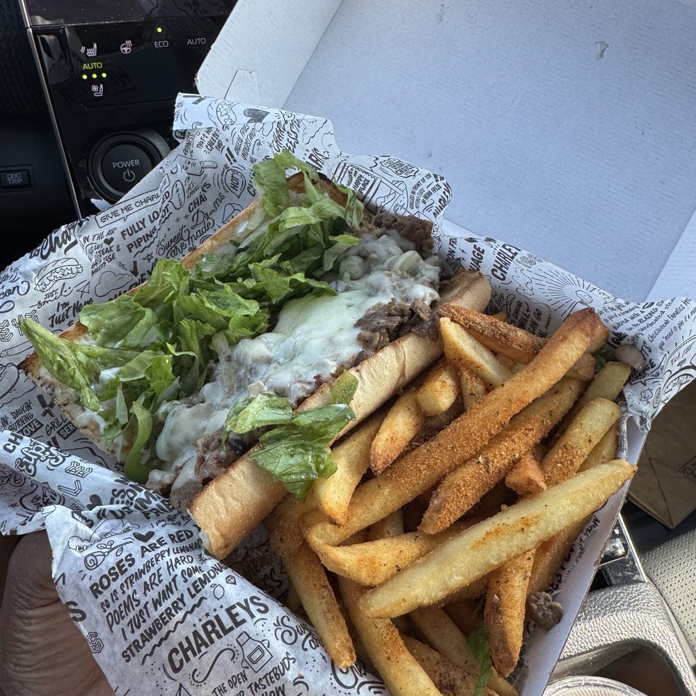 Charleys Cheesesteaks - PHILLY CHEESESTEAK with LOUISIANA CAJUN FRIES - Sandwiches Near Me - Bowie, Maryland Charleys Cheesesteaks - PHILLY CHEESESTEAK with LOUISIANA CAJUN FRIES - Sandwiches Near Me - Bowie, Maryland