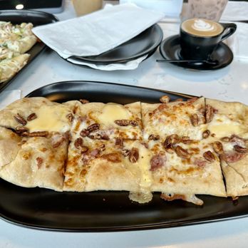 Swagg Coffee Bar - Prosciutto honey Gouda flatbread - Coffee & Tea Near Me - West Richland, Washington Swagg Coffee Bar - Prosciutto honey Gouda flatbread - Coffee & Tea Near Me - West Richland, Washington