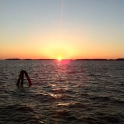 Osprey Point Retreat and Conference Center - Sunset over the Chesapeake from the end of the pier.