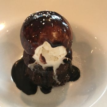 Orta Trattoria and Lounge - Chocolate flourless with vanilla gelato. - Italian Near Me - Kingston, Massachusetts Orta Trattoria and Lounge - Chocolate flourless with vanilla gelato. - Italian Near Me - Kingston, Massachusetts