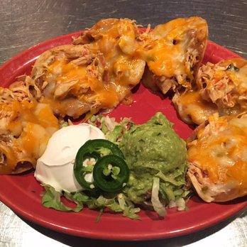 Uncle Julio's - Mama Julio Nachos w/ Pulled Chicken - Mexican Near Me - Bethesda, Maryland Uncle Julio's - Mama Julio Nachos w/ Pulled Chicken - Mexican Near Me - Bethesda, Maryland