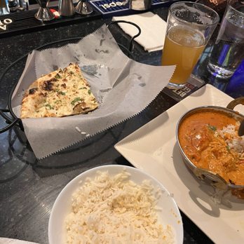 Paradise Tavern - Butter chicken with garlic naan - Sports Bars Near Me - Lone Tree, Colorado Paradise Tavern - Butter chicken with garlic naan - Sports Bars Near Me - Lone Tree, Colorado