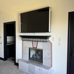 New drywall and TV mount where there was broken tile etc.