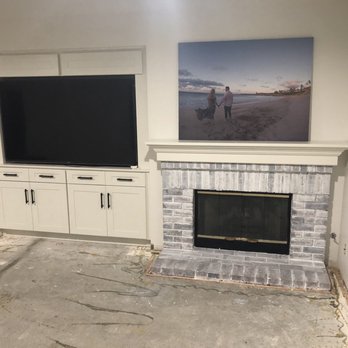 Tower Nine Kitchen & Bath Remodeling - They also did this amazing built in entertainment center! The TV fully swings out so you can watch from the kitchen as well! AMAZING! - General Contractors Near Me - Oceanside, California