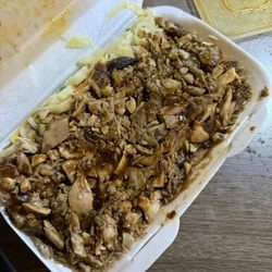 Caribbean Flavas - Jerk Chicken and Rice on the bone "apparently"