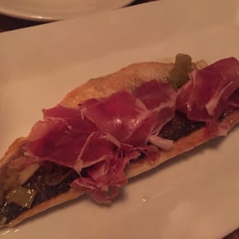 Niu Kitchen - Branzino Filet (Warm Garlic, Green Chile Vinaigrette, Jamon Iberico, $27) - Catalan Near Me - Miami, Florida Niu Kitchen - Branzino Filet (Warm Garlic, Green Chile Vinaigrette, Jamon Iberico, $27) - Catalan Near Me - Miami, Florida