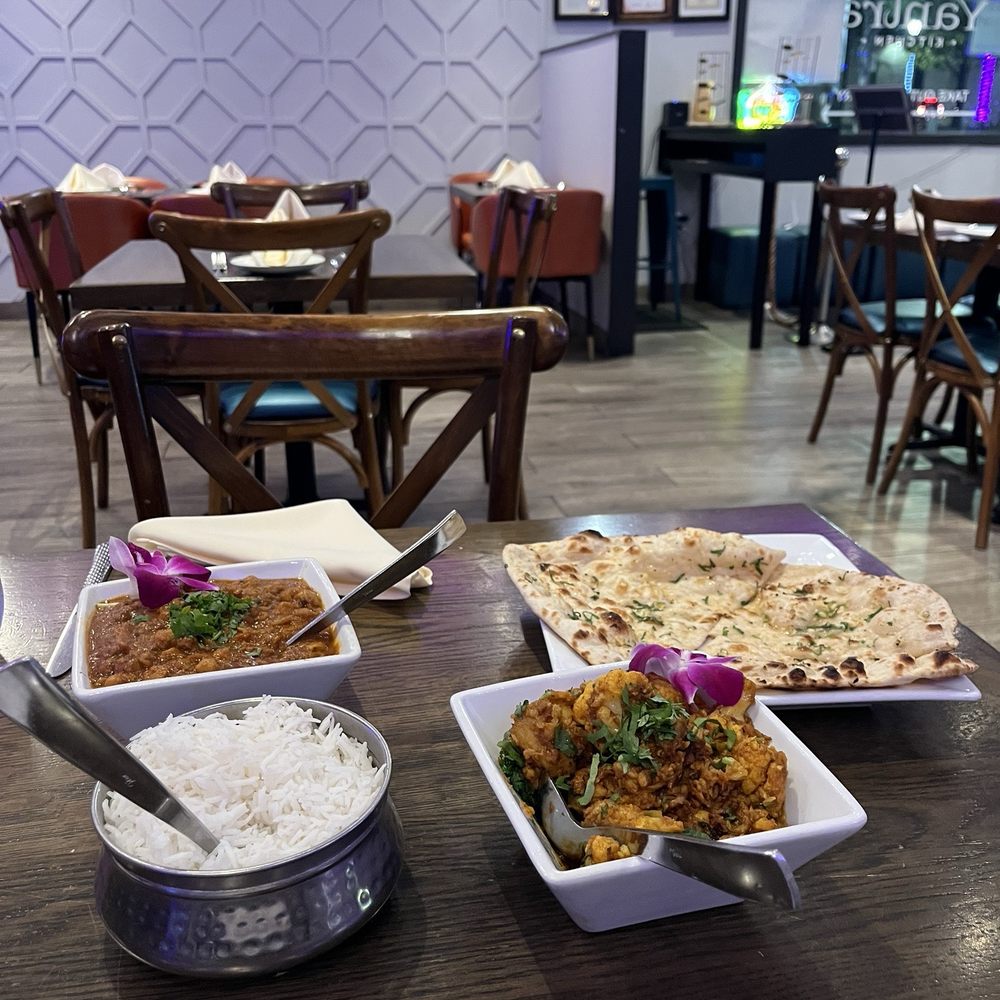 Yantra Kitchen - Aloo Gobi, Amritsari Chole, rice and garlic naan - Indian Near Me - Artesia, California