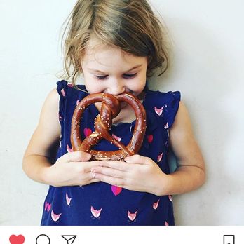 Smittybread Bakery - A young Smittybread fan and her pretzel. - Bakeries Near Me - Lafayette, Indiana Smittybread Bakery - A young Smittybread fan and her pretzel. - Bakeries Near Me - Lafayette, Indiana