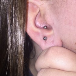 Sacred Art Tattoo - Anti tragus piercing