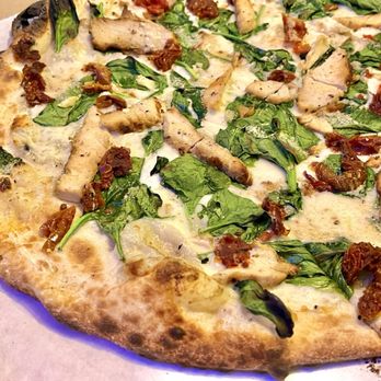 Urbn One Paseo - Gouda Garlic Alfredo Pizza. Chicken is a little dry, but the sun dried tomatoes & spinach made up for it. And yes, it was garlicky. - Pizza Near Me - San Diego, California