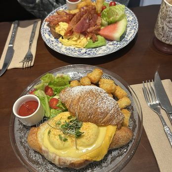 1003 Brunch & Dessert - Brunch eggs Benny and bacon and scramble eggs both with tots and salad - Breakfast & Brunch Near Me - Burnaby, British Columbia