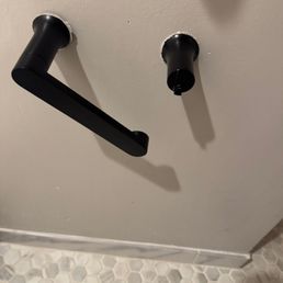 Broken toilet paper holder
